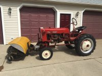 Farmall Cub with  Sweepster Broom Attachment